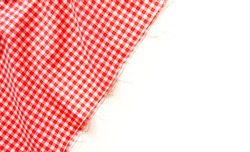 Classic pink plaid fabric or tablecloth on white background with copy space. 