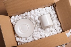 Fragile porcelain in loose white Filler Shipping Packing Peanuts