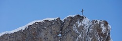 Summit cross on the mountain High Ifen 2230m