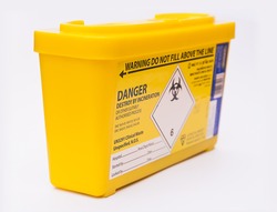 Medical or clinical sharps yellow waste container