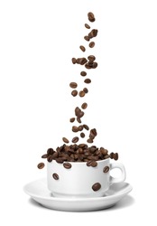 Coffee beans falling in white coffee cup. Highspeed shot