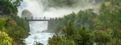 Bridge in waterfall, Norway. Jostedalsbreen national park 
