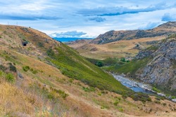 Valley of Taieri river at Central Otago Railway bicycle trail in New Zealand