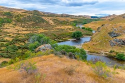 Valley of Taieri river at Central Otago Railway bicycle trail in New Zealand