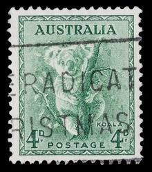 Circa 1937, vintage cancelled postage stamp from Australia featuring a koala