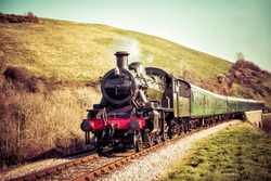 Steam Train Locomotive traveling in the Countryside