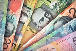 Australian Dollar bills creating a colorful background