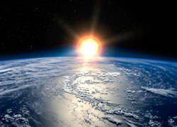 Earth with the rising sun. Elements of this image furnished by NASA