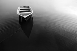 Reflection of Boat During in Black and White