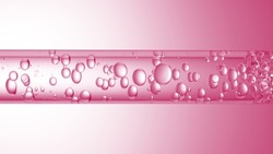 Macro shot of different sized clear bubbles flowing in glass tube with clear liquid on pale pink background | Abstract body care cosmetics mixing concept
