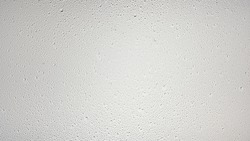 Small size water drops wet glass surface on grey background, Misted glass | Overlay foreground or background for shower hygiene and skin moisturizing beauty products