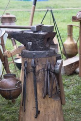 Tools and accessories of the ancient blacksmith forge with air fur blowing