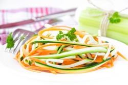 Fresh salad of sliced thin strips of carrot and zucchini