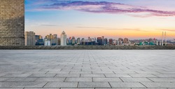 Empty square floor and Shanghai skyline with buildings at dusk,China.High angle view.