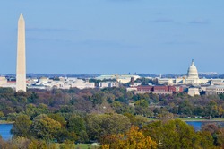 Washington DC skyline in autumn with Washington Monument, United States Capitol building and Potomac River