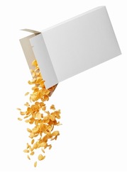 pouring corn flakes from its box isolated on white