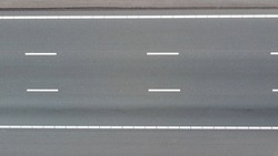 Aerial top down view of a three lane major highway