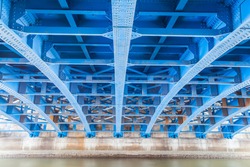 Perspective of Steel construction from under the bridge
