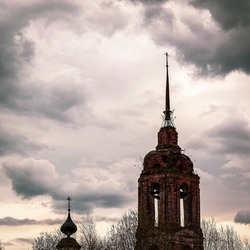 the spire of the Orthodox bell tower , the village of Shishkino, Kostroma region, Russia. The year of construction is 1746.