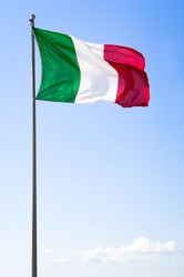 italian flag in front of blue sky
