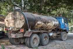 Abandoned car tank. Petrol Trucks with rust chrome tank.  car and fuel or gas tanker truck side view. transport loads