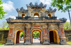 The East Gate (Hien Nhon Gate) to the Citadel with the Imperial City in Hue, Vietnam. The colorful gate is a popular tourist attraction of Hue.