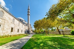 Awesome view of scenic gardens of the Suleymaniye Mosque in Istanbul, Turkey. The Ottoman imperial mosque is a popular destination among pilgrims and tourists of the world.