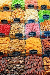 Wide range of dried fruits at the Grand Bazaar in Istanbul, Turkey. The historical market is a popular tourist destination and one of oldest markets in the world.
