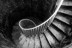 spiral staircase outdoors in black and white