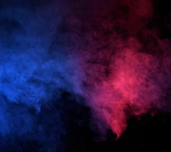Abstract blue and pink  smoke on a dark background. Blue and pink  smoke background