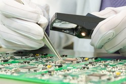 Quality control of electronic components on PCB in laboratory high-tech factory