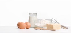 Food ingredients on the table, sugar eggs and flour