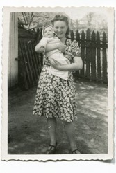 Vintage photo of young mother with her baby (forties)
