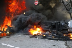 Riots in the city, citizens in conflict with the power harness tires and vehicles police disperse demonstrators in Europe, protesting people fighting for their rights, is also breaking the law