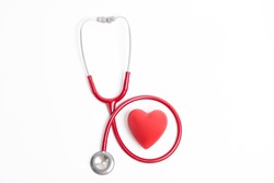 Stethoscope and red heart isolated on white background
