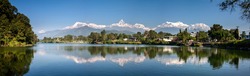 View at Annapurna mountain range and its reflection in Phewa lake in Pokhara, Nepal