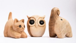 Cat, Owl and Elephant wooden dolls with white background