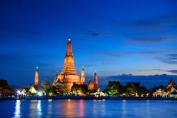Wat Arun is a very beautiful Buddhism architecture pagoda at night skyline in Bangkok, Thailand 