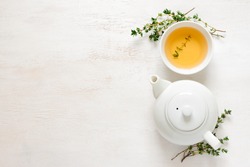 Thyme herbal tea, view from  above, space for a text