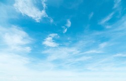 Summer Blue Sky and white clouds background. Beautiful clear cloudy in sunlight spring season. Cirrus vivid cyan cloudscape in nature environment. Outdoor horizon skyline fall spring sunshine day.