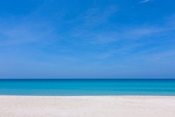 Blue sky and white sand at a beach in Sabah, East Malaysia, Borneo