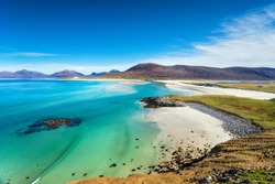 The beautiful sandy beach and clear turquoise sea at Seilebost on the isle of Harris in the Western isles of Scotland
