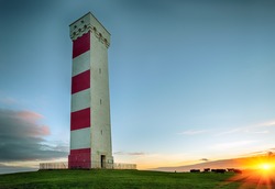 Sunset at the Gribbin Head lighthouse in Cornwall