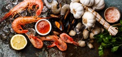 Seafood with fresh raw Mussels, Clams, Vongole, Prawns, Shrimps and Ingredients