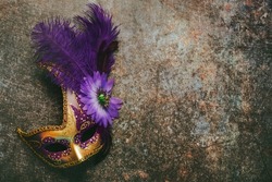 Venetian carnival mask  with copy space over grunge background. Carnival celebration concept