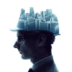 Double exposure of a engineer and urban cityscape.