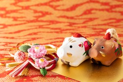 Dolls of boar. Japanese new year card.