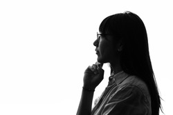 Silhouette of young asian woman.
