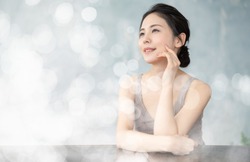 Beauty concept of a young asian woman. Skin care. Body care. Cosmetics.