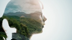 Silhouette of girl and natural landscape. Double exposure.